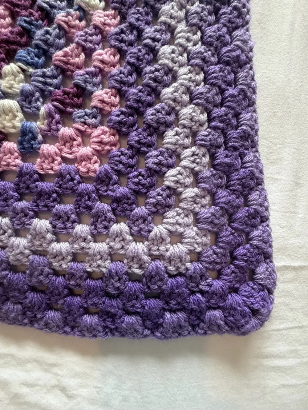Cozy Purple Crochet Throw Blanket with Pastel Accents